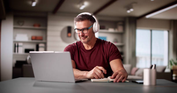 istock College Teacher At Home Using Laptop 2194155905