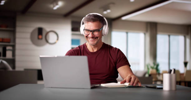istock College Teacher At Home Using Laptop 2194155914