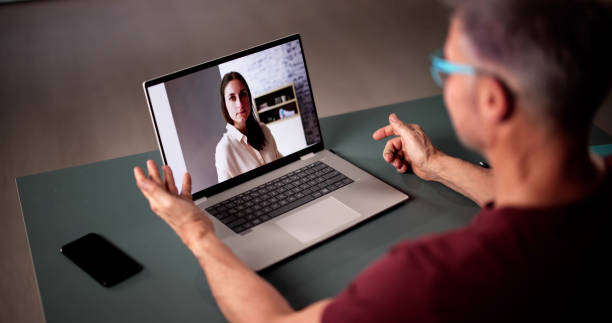 istock Person Having Video Chat With Woman 2194155917