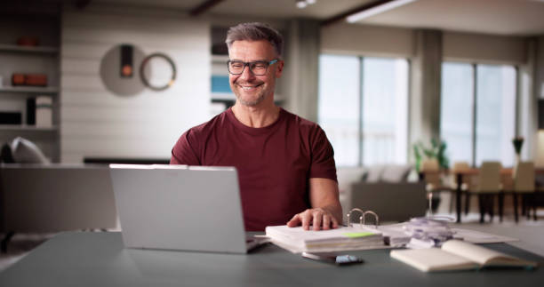istock Man Doing Taxes And Family Budget 2194156431