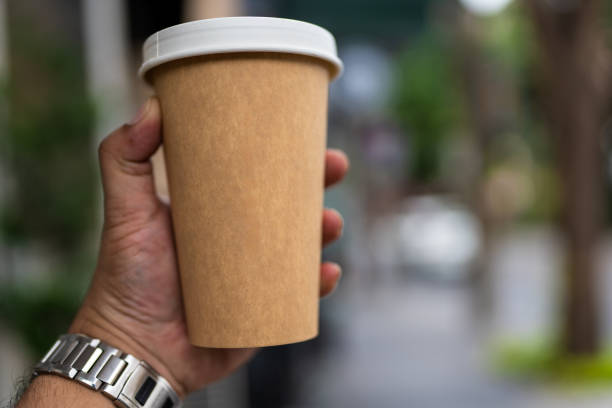 istock Brown paper cup with white lid 2194156710