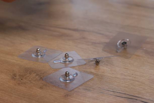 istock Self-adhesive holders. Laid out on the table. Close-up. 2194156858
