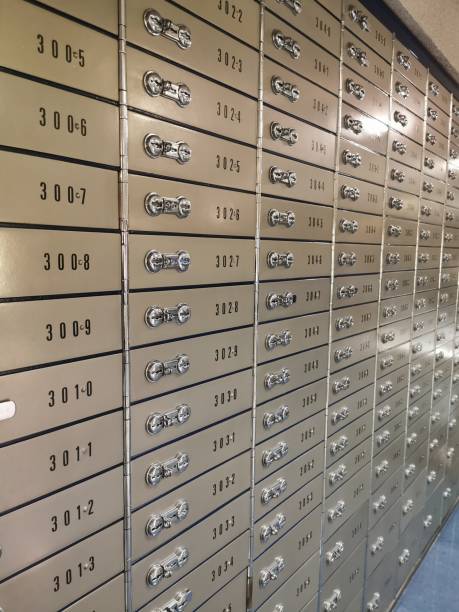 a man pulls an ad out of his  letterbox