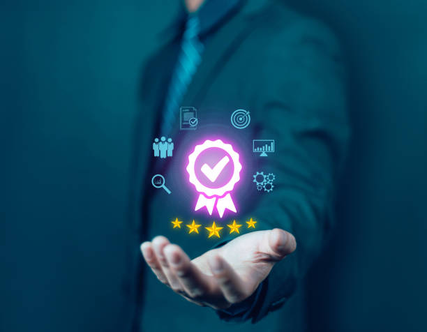 istock Businessman holding quality certification mark, audit, business, assurance, control, digital, service, complete, assessment, checklist, data with quality icon. 2194157861
