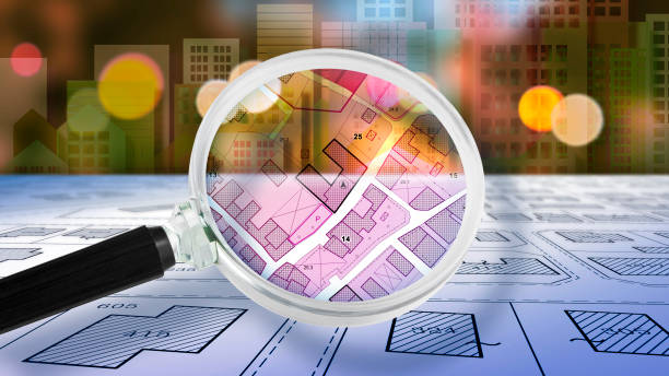 FIND VACANT LAND FOR BUILDING ACTIVITY AND HOME DEVELOPMENT - Concept with magnifying glass on cadastral map to find the plots of land - Building roject concept FIND VACANT LAND FOR BUILDING ACTIVITY AND HOME DEVELOPMENT - Concept with magnifying glass on cadastral map to find the plots of land - Building roject concept planning zoning stock pictures, royalty-free photos & images