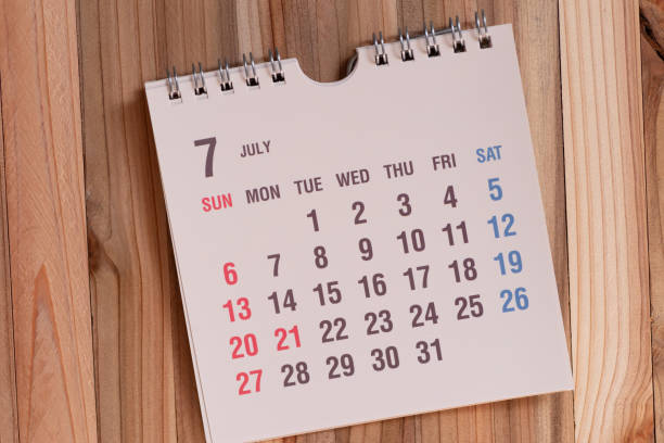 July 2025 calendar on blue background. Horizontal composition. Reminder concept.