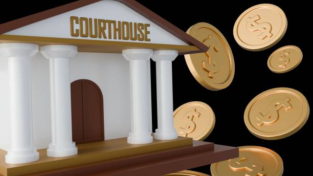 istock A miniature courthouse and scattered gold coins 2194164920