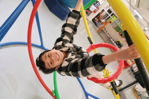 istock Boy having fun on gyroscope at science center 2194166832