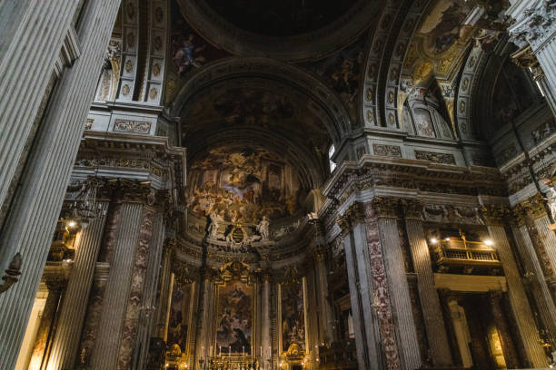 The breathtaking interior of the Church of Sant’Ignazio di Loyola in Rome. A masterpiece of Baroque art, the ceiling frescoes create a stunning illusion of architectural depth, drawing the eyes upward in awe. The intricate details and vivid colors bring to life the glory of religious devotion and artistic excellence.