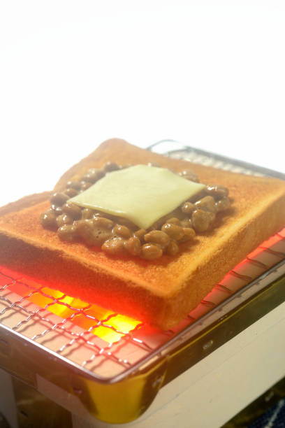 istock Place natto on bread and grill it on a charcoal grill. 2194170585