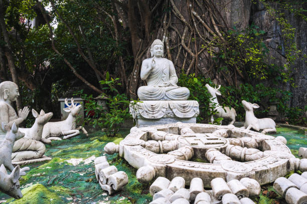 istock Several white marble Buddha statues on the Marble Mountains in Da Nang. 2194172544