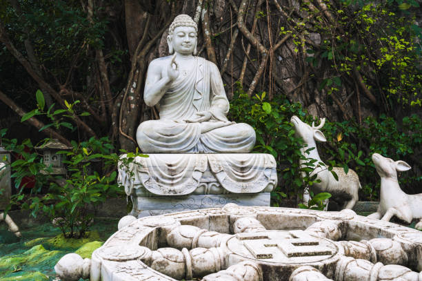 istock Several white marble Buddha statues on the Marble Mountains in Da Nang. 2194172600