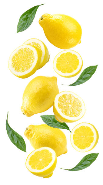 istock flying sliced lemon with green leaves isolated on white background. clipping path 2194173434