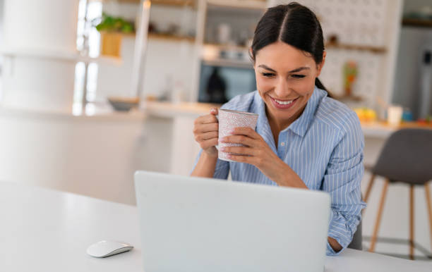 istock Happy young woman freelancer working on computer, studying online, shopping in internet store. 2194174639