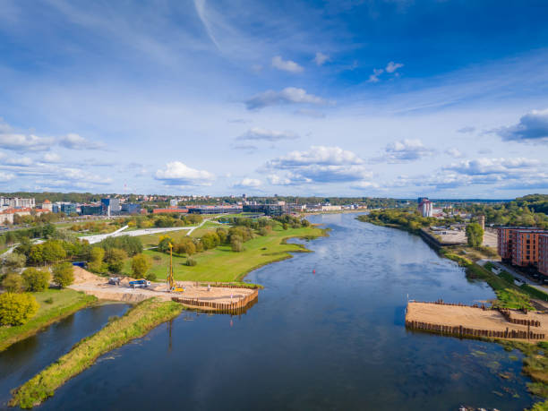 istock Construction progress of a new modern bridge building. Aerial drone view 2194174716