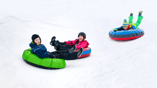 istock Kids Winter Snowtubing 2194175062