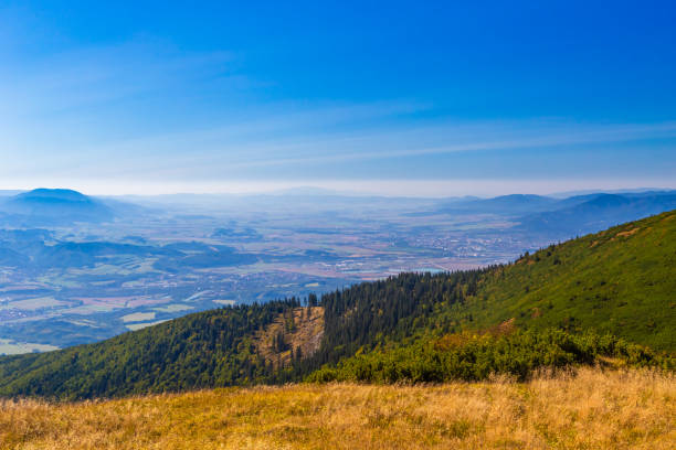 istock Panoramic view from Chleb summit. Mala Fatra, Velka Fatra mountains and Vtacnik peak in the background 2194175719