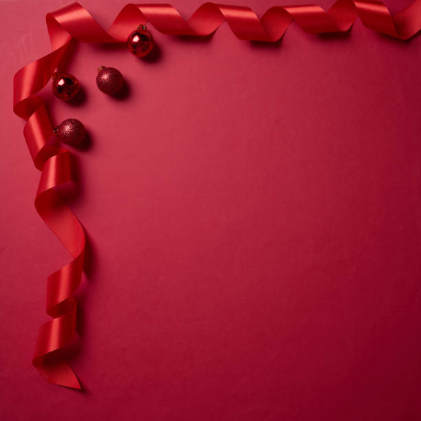istock Red ribbon lay on the corner on red background, element for design with copy space for text or image 2194179904
