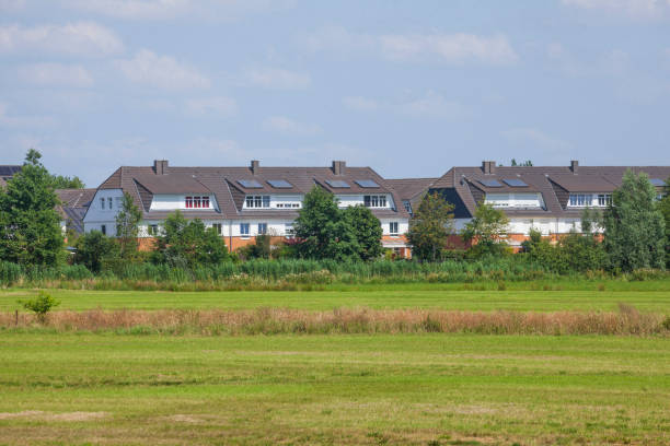 istock Modern residential building surrounded by greenery with meadow in Bremen-Horn, Bremen, Germany 2194180136