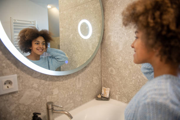 istock Young girl's morning routine hair brushing 2194180751