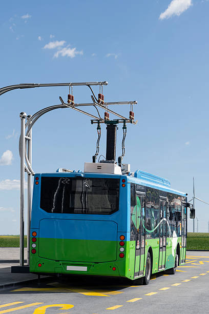 istock Electric bus at a stop is charged by pantograph. Clean mobility. 2194180824
