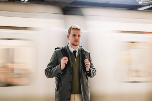 istock Businessman waiting for the train in subway station 2194183609