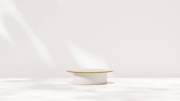 istock Empty stands showcasing products accompanied by podiums in white and gold displayed in a landscape 2194183772