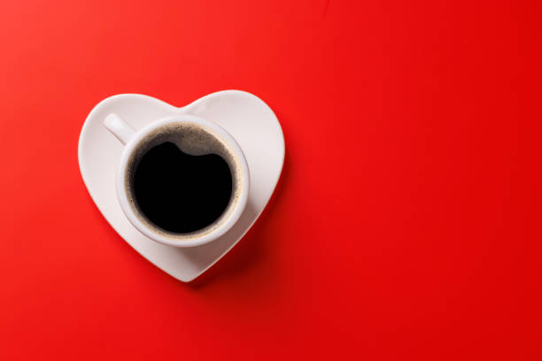 istock A charming coffee cup placed on a heart-shaped saucer 2194184591