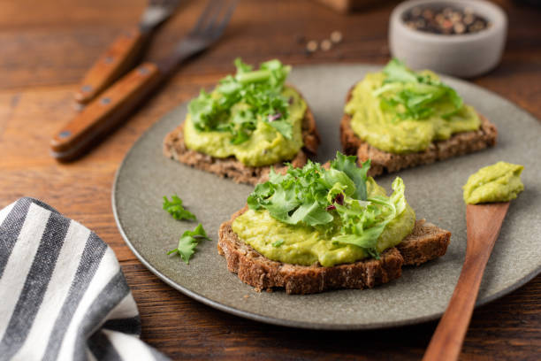 istock Avocado toast with rye bread and green leaf salad 2194185626