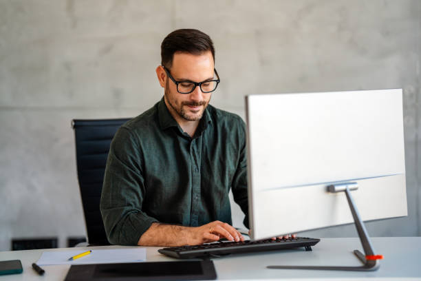 istock Success young professional businessman investor,manager at workplace working on computer in office 2194185974