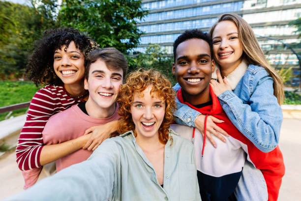 istock Happy young group of student people having fun taking selfie oudoors 2194187048