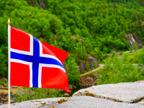 istock Norwegian flag on green nature 2194189448