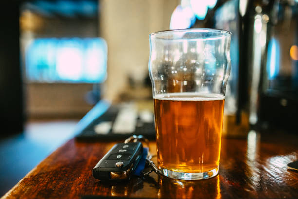 istock Beer and car keys at the bar counter, drunk driving concept 2194190126