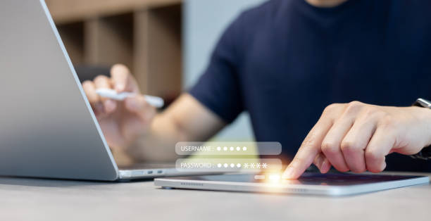 istock executive employee use digital tablet to access account on private account on internet by input username and password at office for security of business and PDPA system  technology concept 2194191522