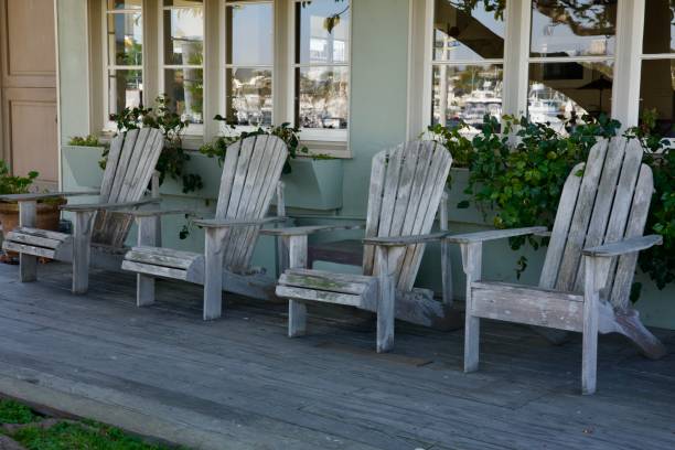 istock Group of old fashioned Adirondack chairs 2194191640