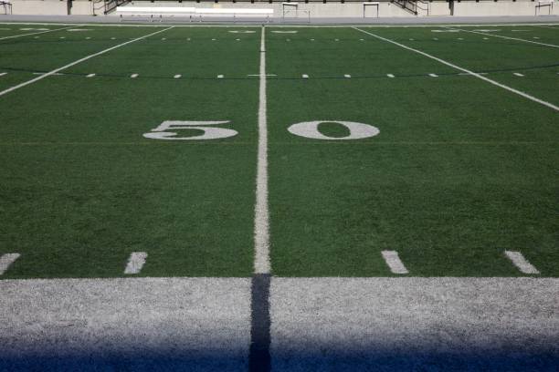 istock High school track and football field 2194191806