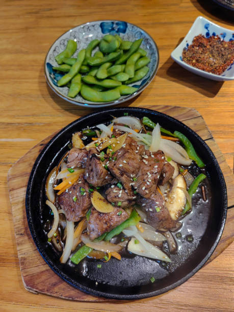 istock Grilled beef sirloin with roasted vegetables on white dish. BBQ 2194192524