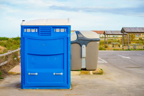 istock Portable wc toilet and big garbage bin outdoors 2194192621