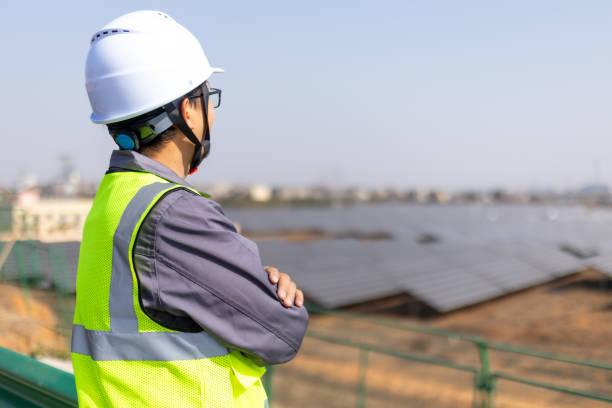 istock Power engineer working in front of solar farm 2194193125