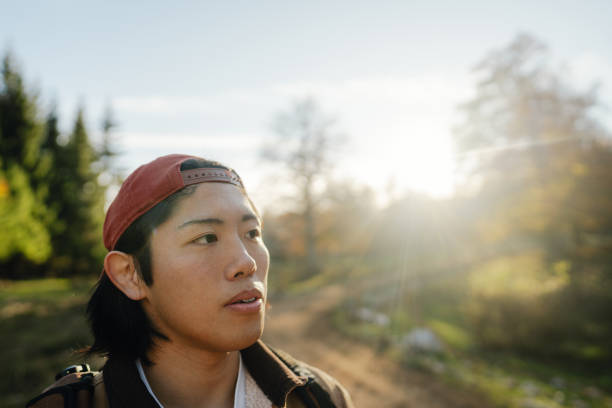 istock Young male backpacker hiking the beautiful nature 2194197251