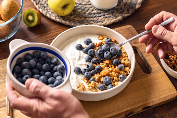 istock Healthy breakfast with Yogurt Granola and Blueberries 2194198075