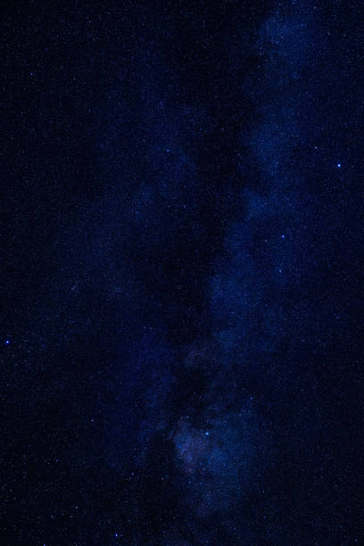 istock Milky Way twinkling stars on a dark night. 2194204475
