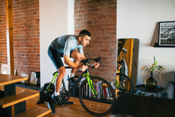 istock Cycling at home on smart trainer. 2194206687