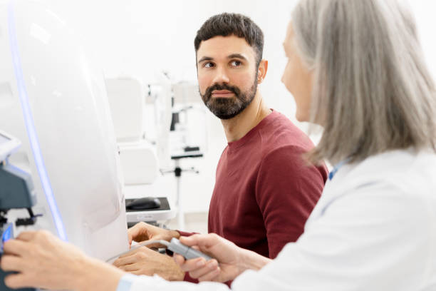 istock Ophthalmologist performing eyesight test with modern equipment 2194207584