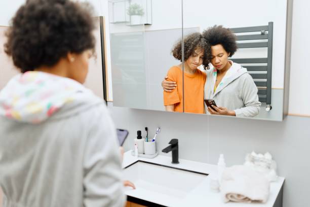 istock Worried mother and son looking at the insulin app 2194209421