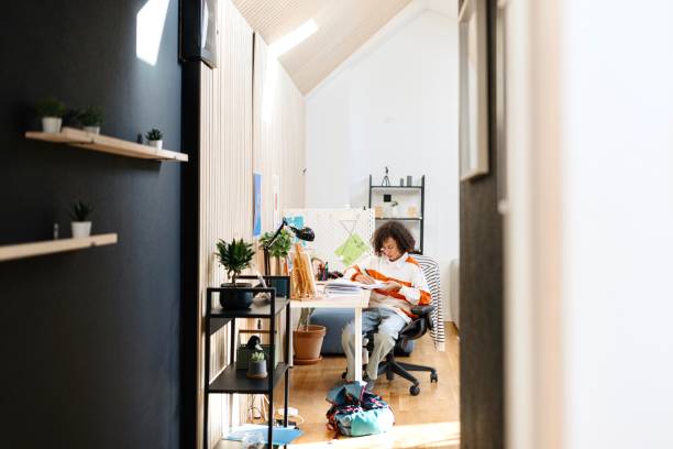 istock Teenager studying at home 2194213321
