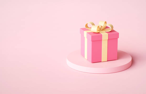 istock Pink gift box on pedestal on a pink background 2194213890