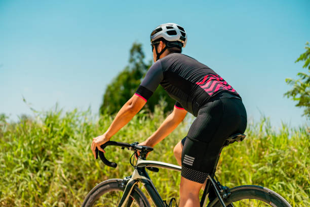 istock Biker riding on a gravel. 2194216515
