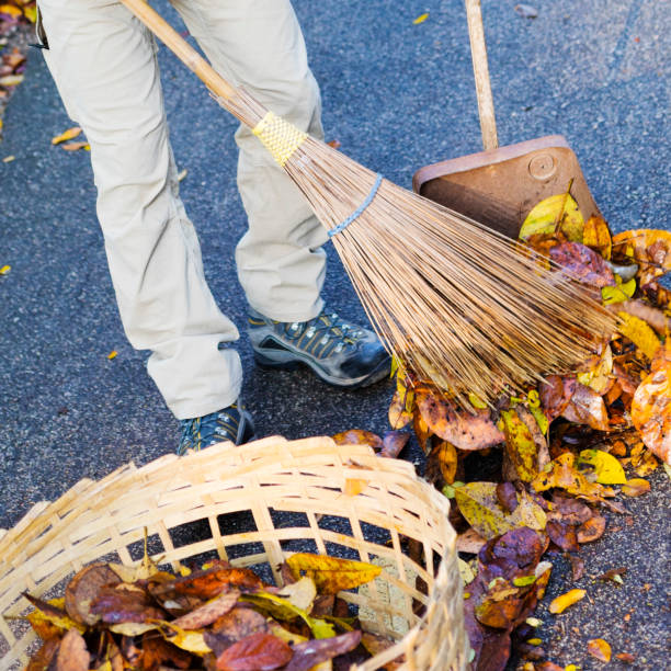istock Thai man is cleaning with broom and shovel  remote road 2194218416