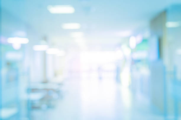 istock Abstract blurred inside interior of hospital building background with shine light for advertisement design and show content concept 2194219594